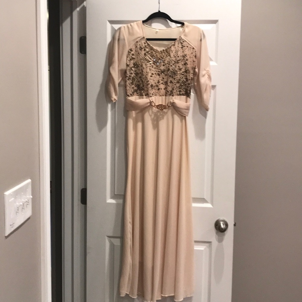 Cream colored dress.